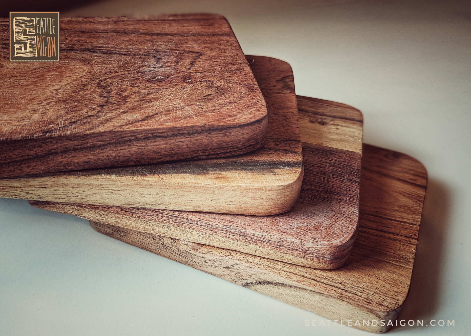 Wooden cutting boards from natural wood in the market. Handmade